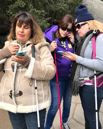 Martha Espitia, Nikki Richards and Sarah Harris testing the UniD mobile app in Yosemite. Photo by: Jamie Gibson-Barrows.