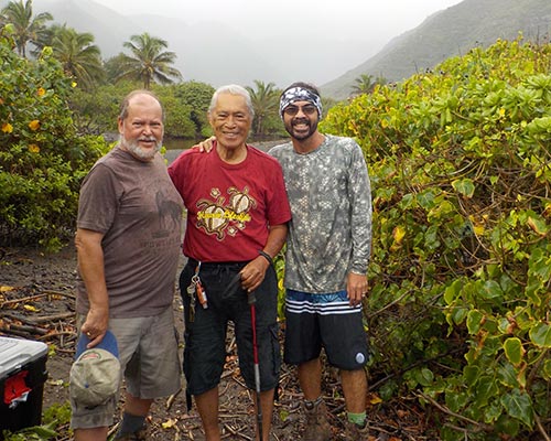 Pat Kirch, Pilipo Solatorio and Greg Solatorio in Halawa Valley during fieldwork in December 2020.