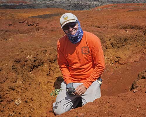 Geography Professor Dave Beilman planting native species on Kaho‘olawe. (Photo courtesy: Jordyn Poyo)