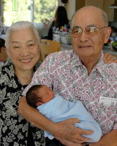 Mildred and Richard Kosaki with their grandson, Reece Richard Kaikea Kosaki, in 2004.
