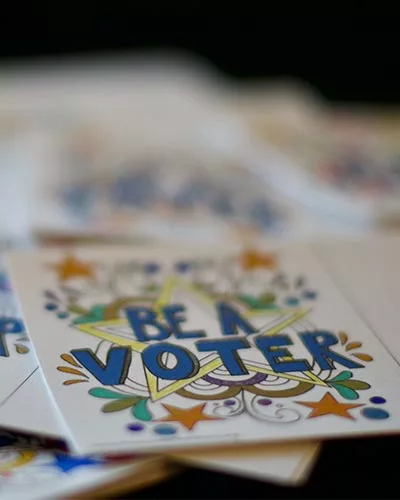 colorful card with the words Be A Voter